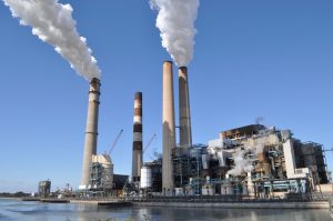 TECO power plant in Apollo Beach Florida burns coal and releases water vapor plus greenhouse gases like carbon dioxide that contribute to climate change