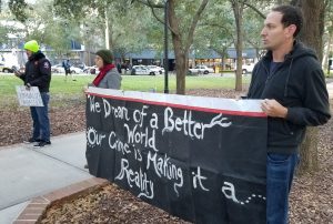 Food Not Bombs sign - We dream of a better world our rime is making it a reality